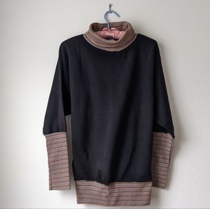 New no tags. Sweater with dolman sleeves.